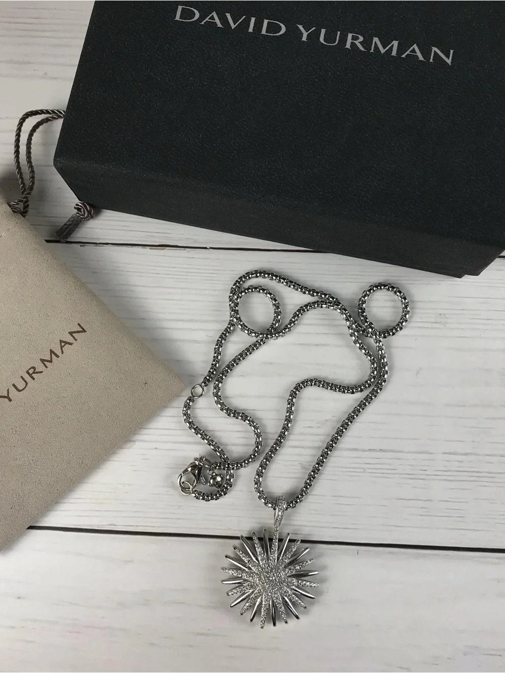 Sparkling Starburst Pendant Necklace in Silver